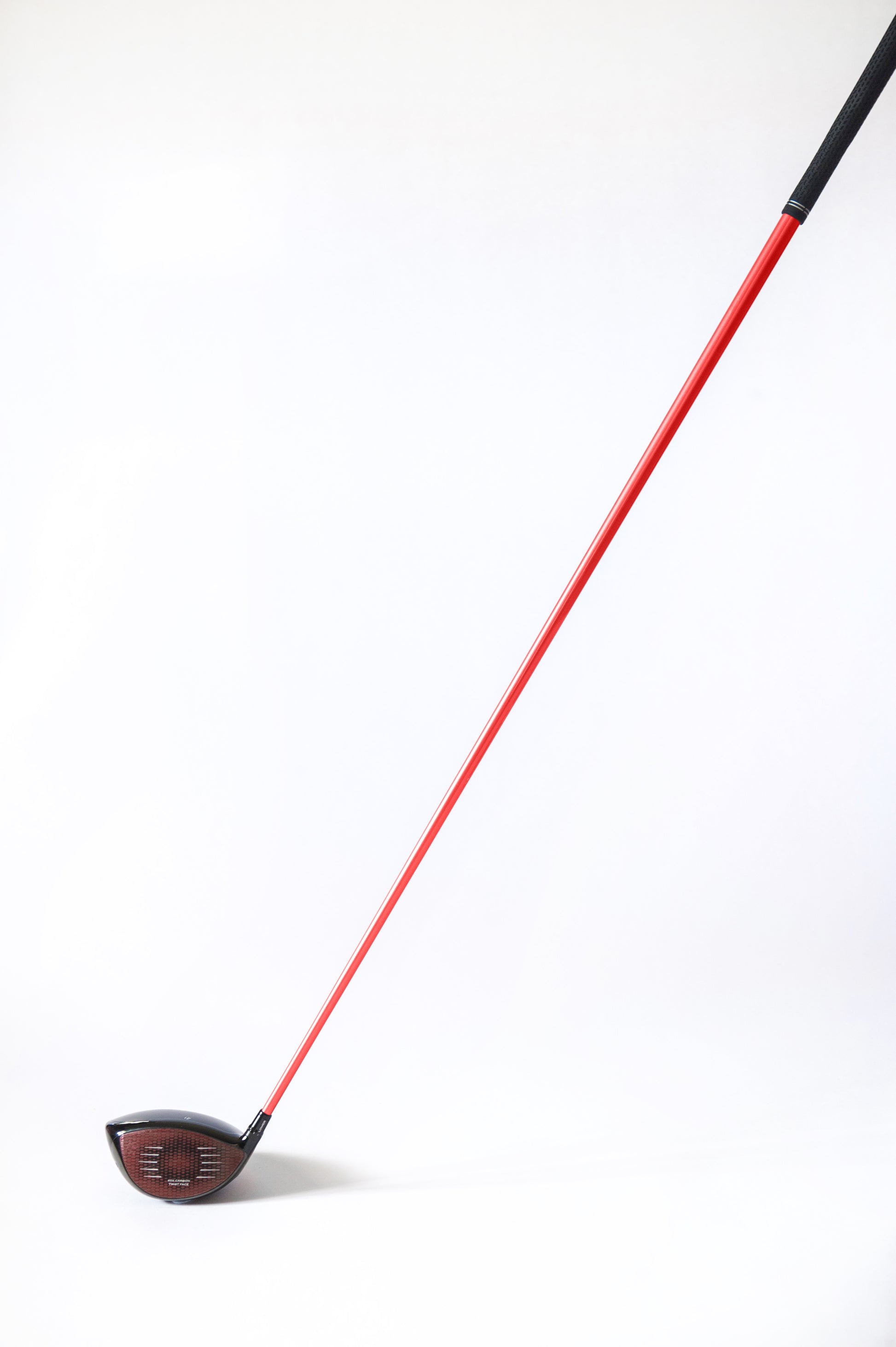 Red golf shaft wrap, face on, stealth driver